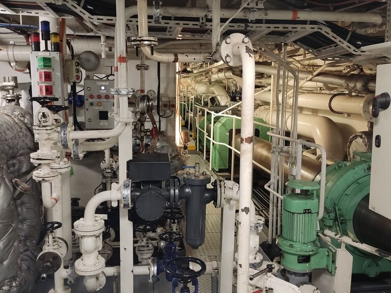 Engine room on cargo ship Timca between Belgium and Finland